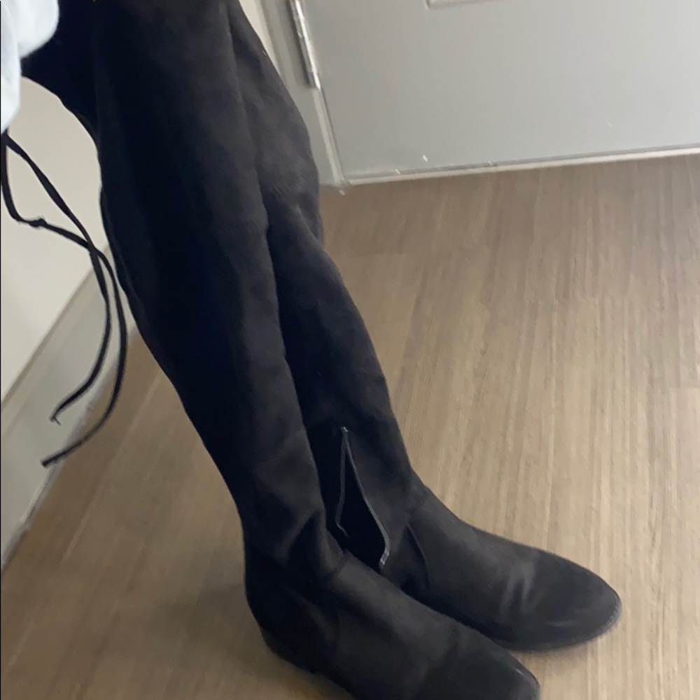 Thigh high black boots